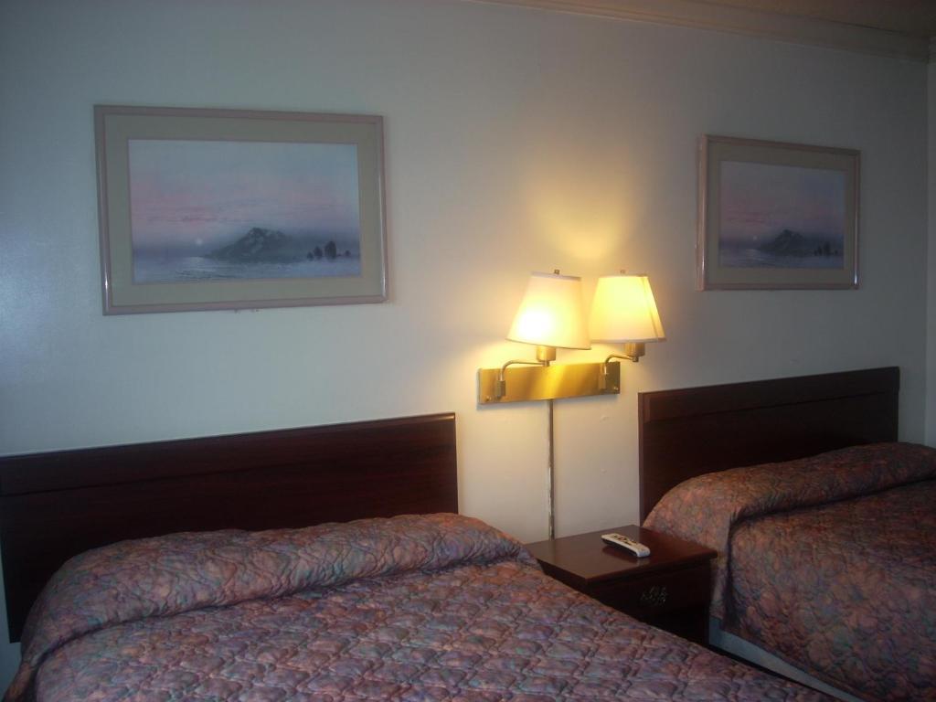 Economy Inn Сийсайд Екстериор снимка