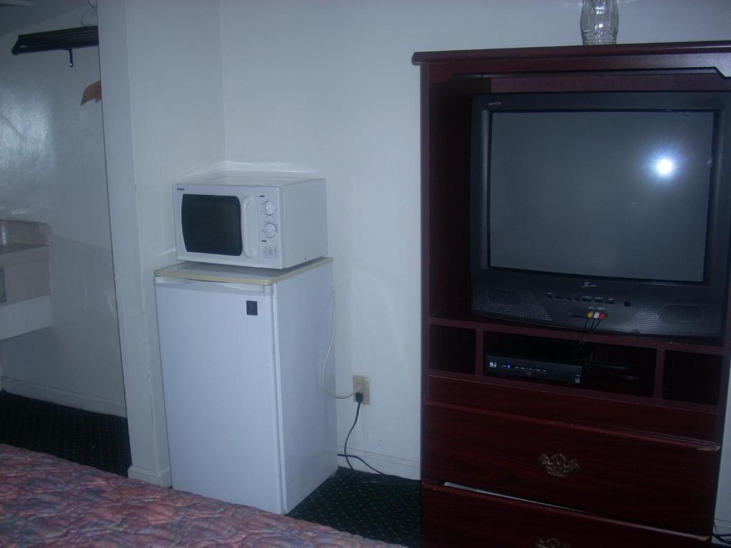 Economy Inn Сийсайд Екстериор снимка