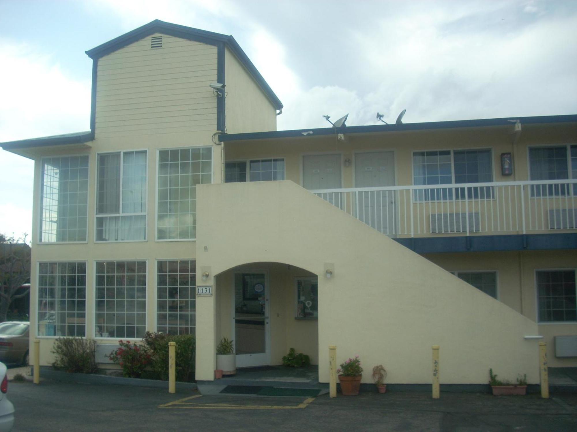 Economy Inn Сийсайд Екстериор снимка